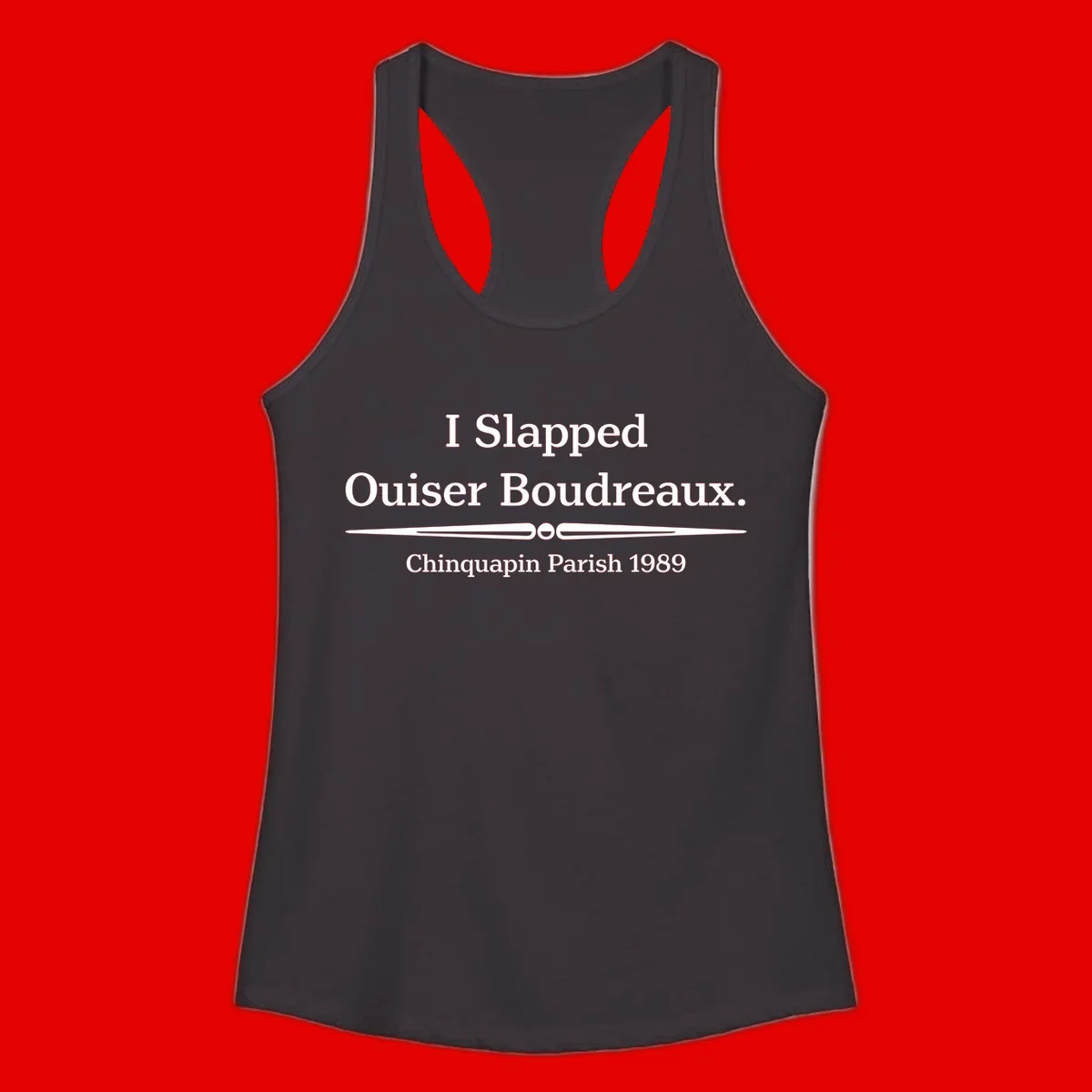 White text on gray background reading 'I Slapped Ouiser Boudreaux. Chinquapin Parish 1989' with decorative line divider