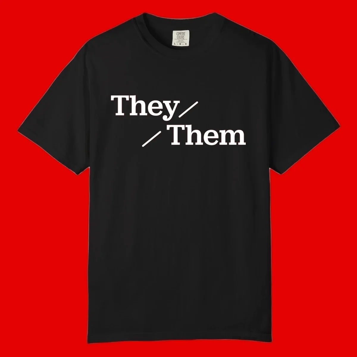Minimalist design with white text reading 'They / Them' on gray background, celebrating gender-inclusive pronouns