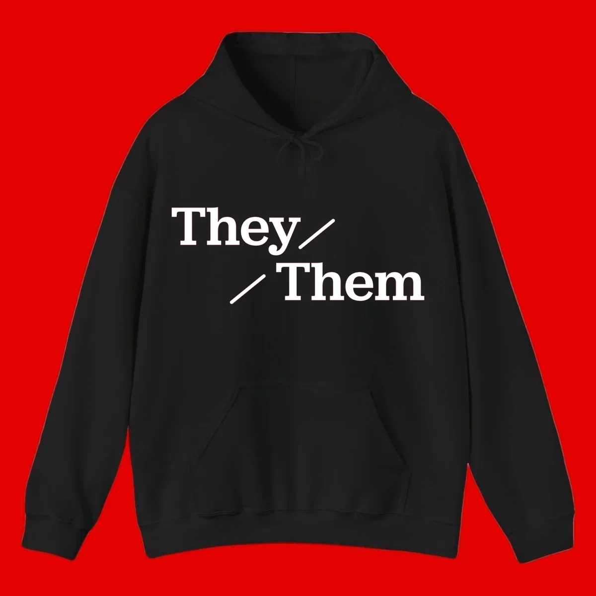 Minimalist design with white text reading 'They / Them' on gray background, celebrating gender-inclusive pronouns