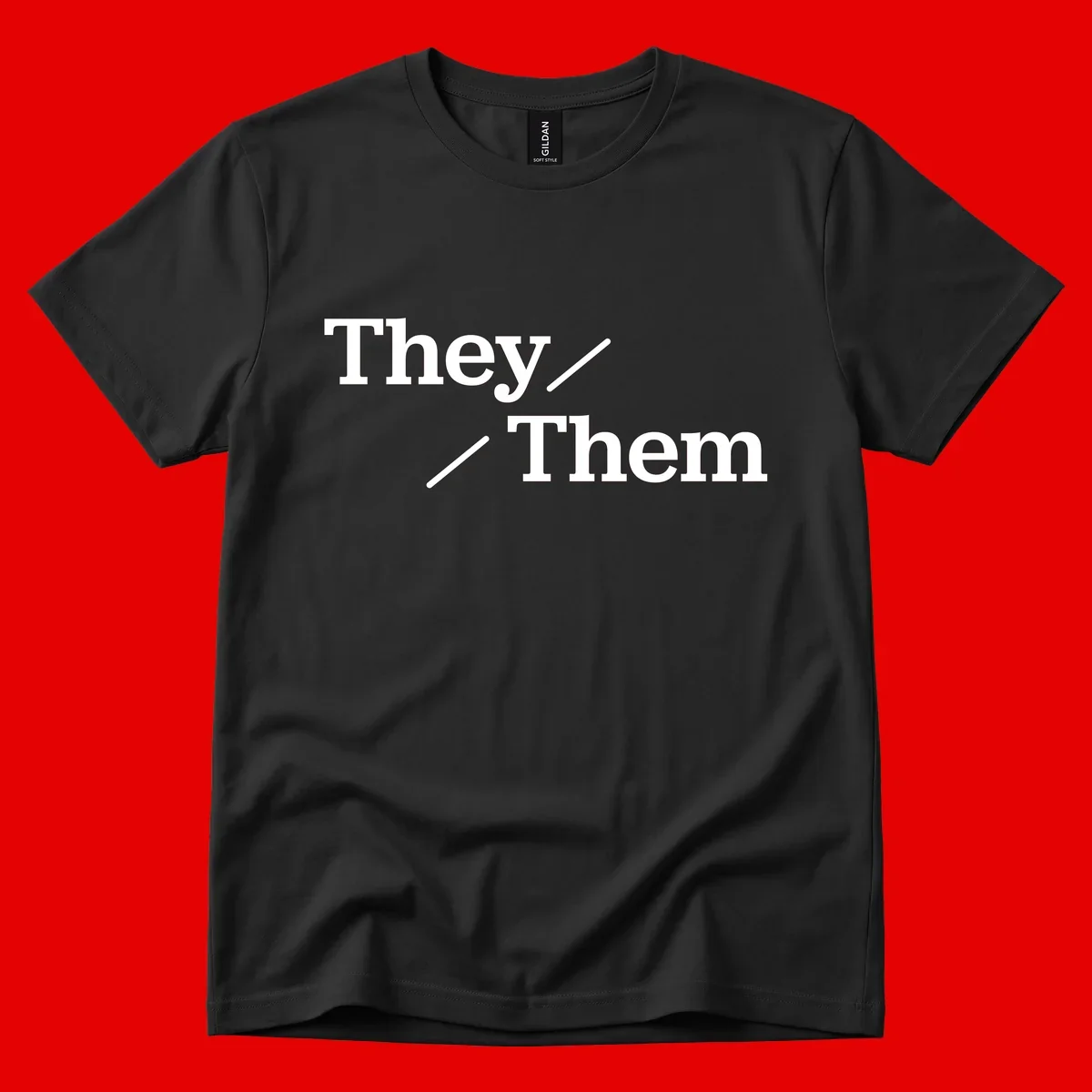 Minimalist design with white text reading 'They / Them' on gray background, celebrating gender-inclusive pronouns
