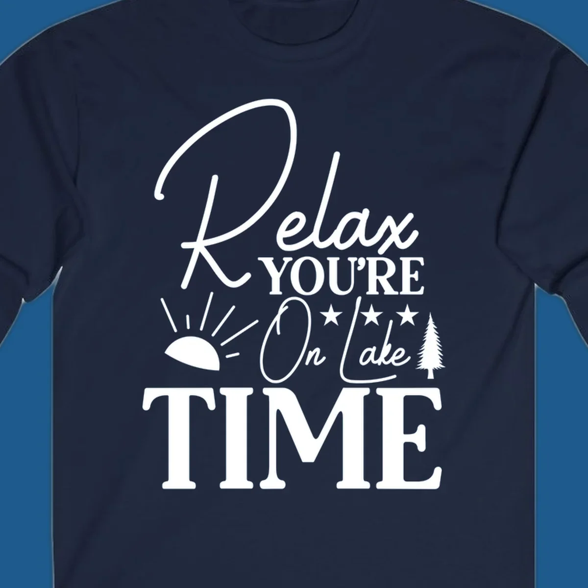 Relax You're On Lake Time text and graphics with sun rays and a pine tree.