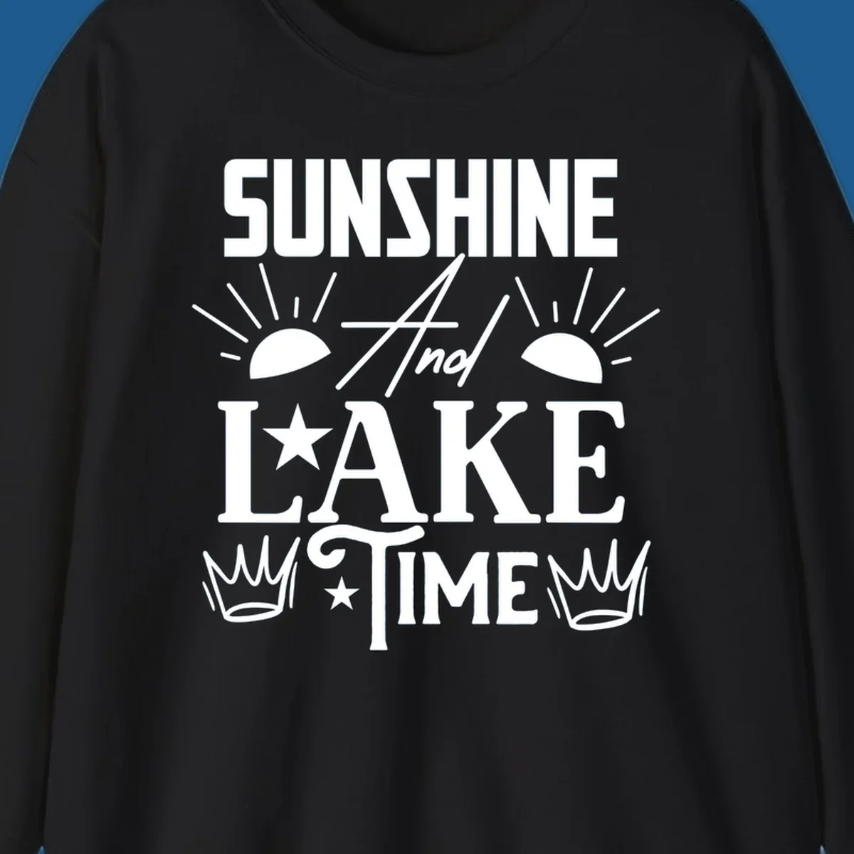 Sunshine and lake time text design with sun, star, and crown graphics.