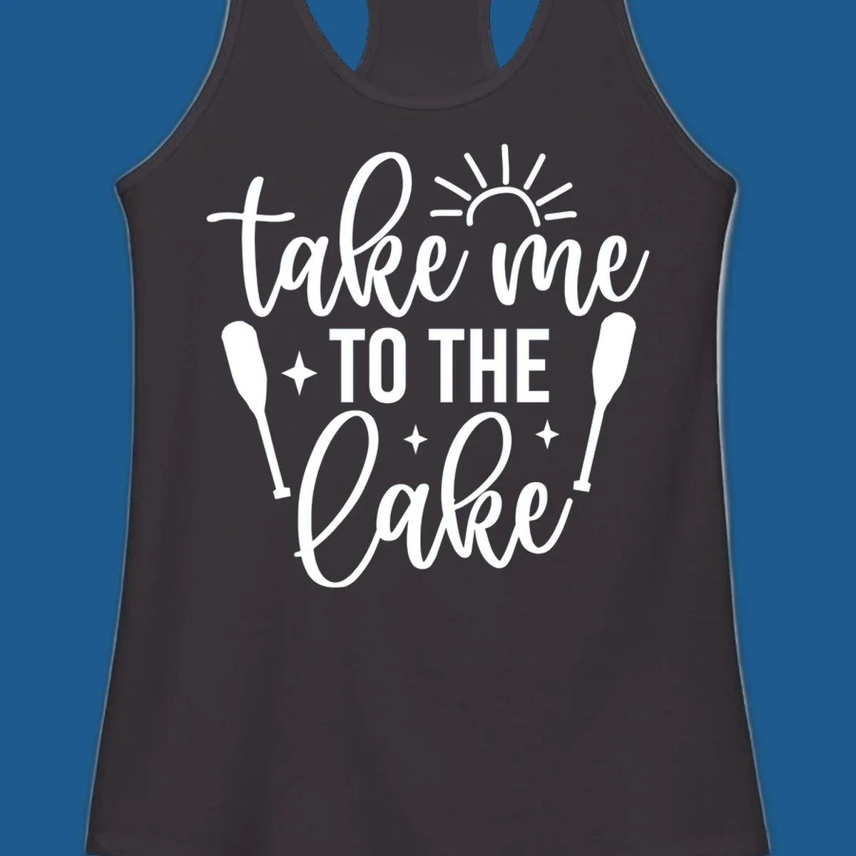 Typography design with 'take me TO THE Lake', sun, paddles, and stars for lake life vibes.