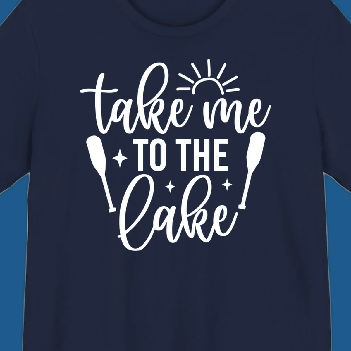 Typography design with 'take me TO THE Lake', sun, paddles, and stars for lake life vibes.