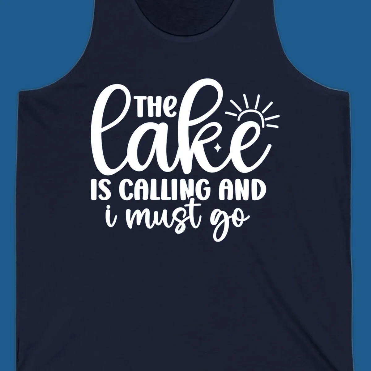 The lake is calling and I must go text with sun and star graphic