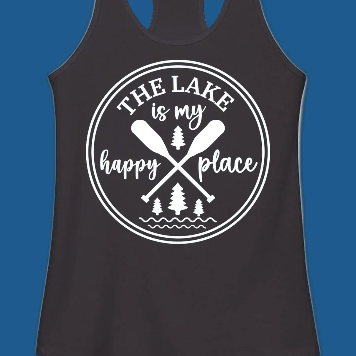 Circular graphic with text 'The Lake is my happy place', crossed oars, and pine trees - lake-happy-place.