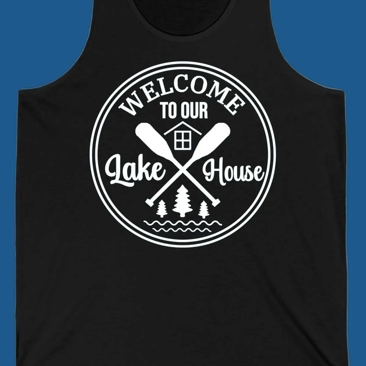 Circular badge design with text 'WELCOME TO OUR Lake House', crossed oars, house, trees, and waves.