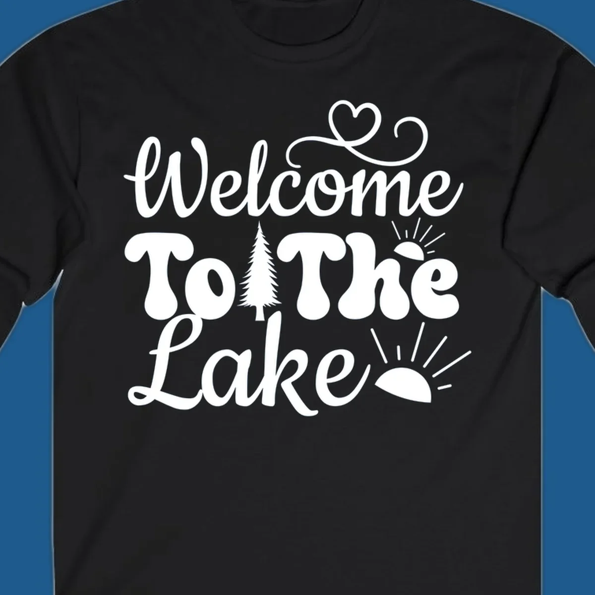 Welcome to the lake typography design with tree and sun graphics.