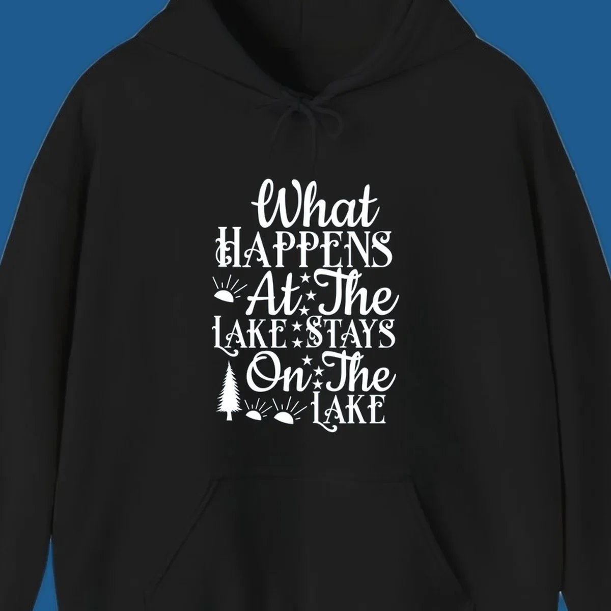 What Happens At The Lake text design with sun, stars, and pine tree.