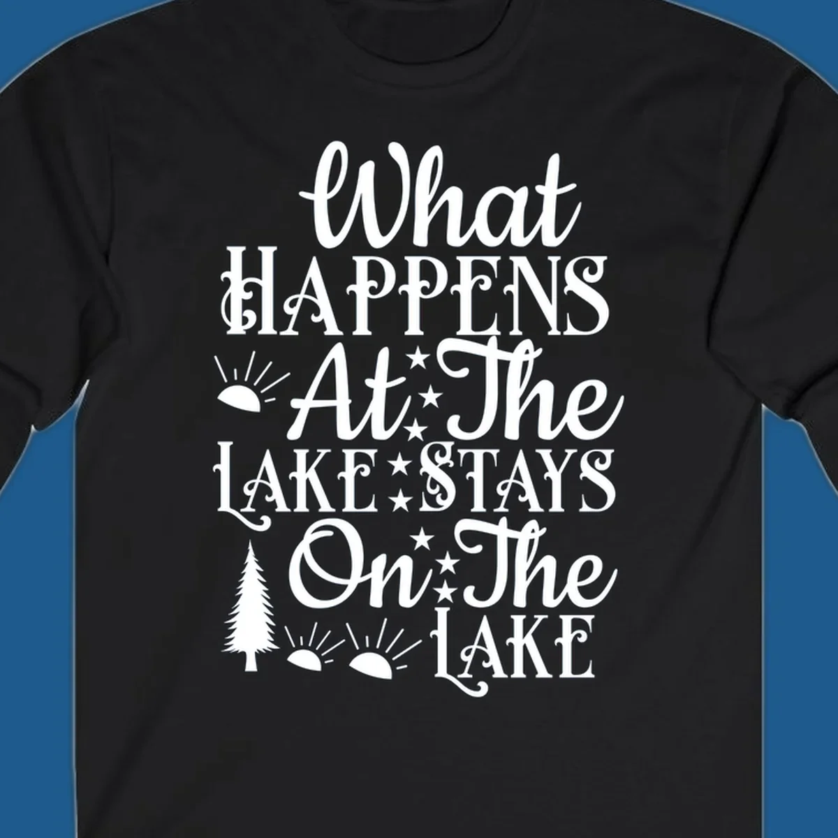 What Happens At The Lake text design with sun, stars, and pine tree.