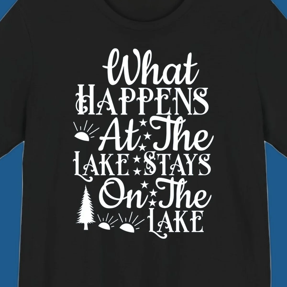What Happens At The Lake text design with sun, stars, and pine tree.