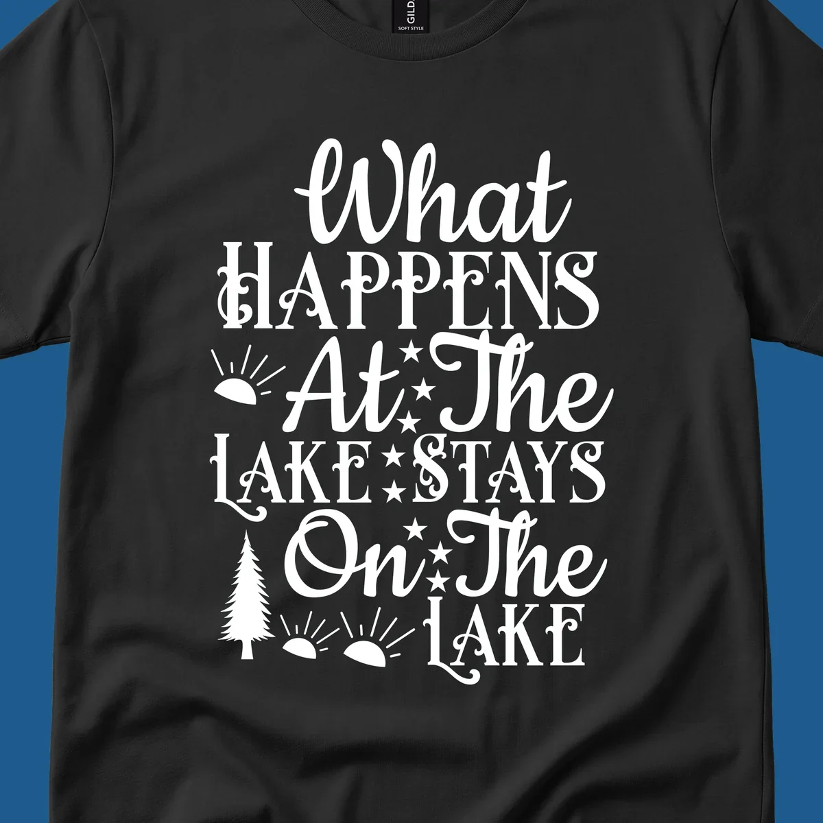 What Happens At The Lake text design with sun, stars, and pine tree.