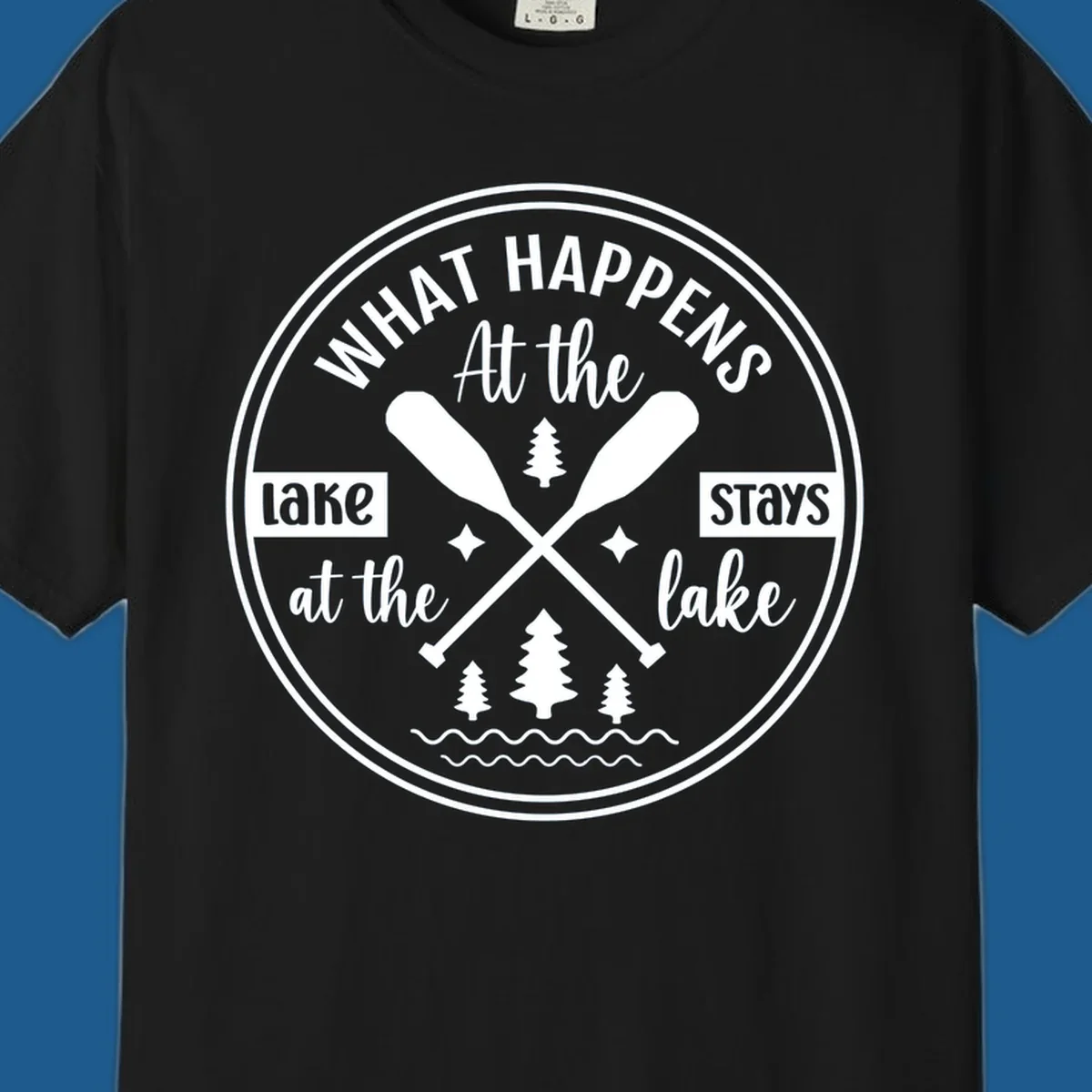 Lake life quote design with paddles and trees.