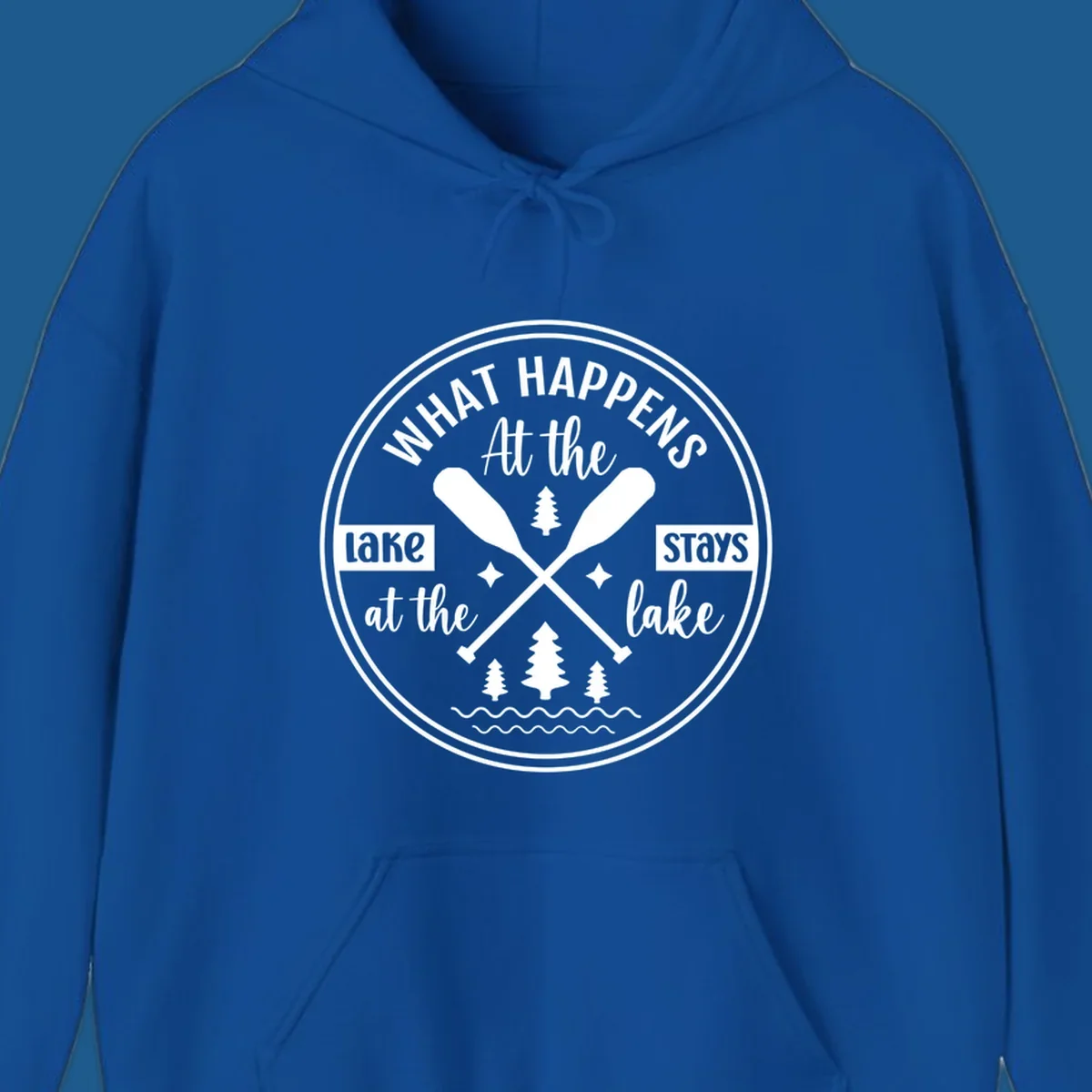 Lake life quote design with paddles and trees.