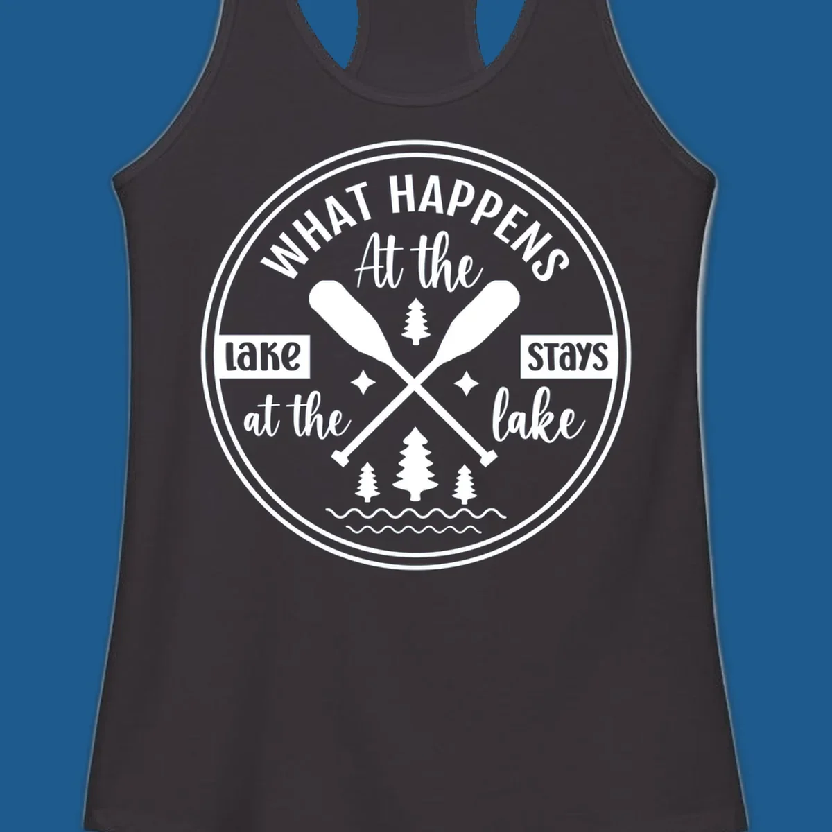 Lake life quote design with paddles and trees.