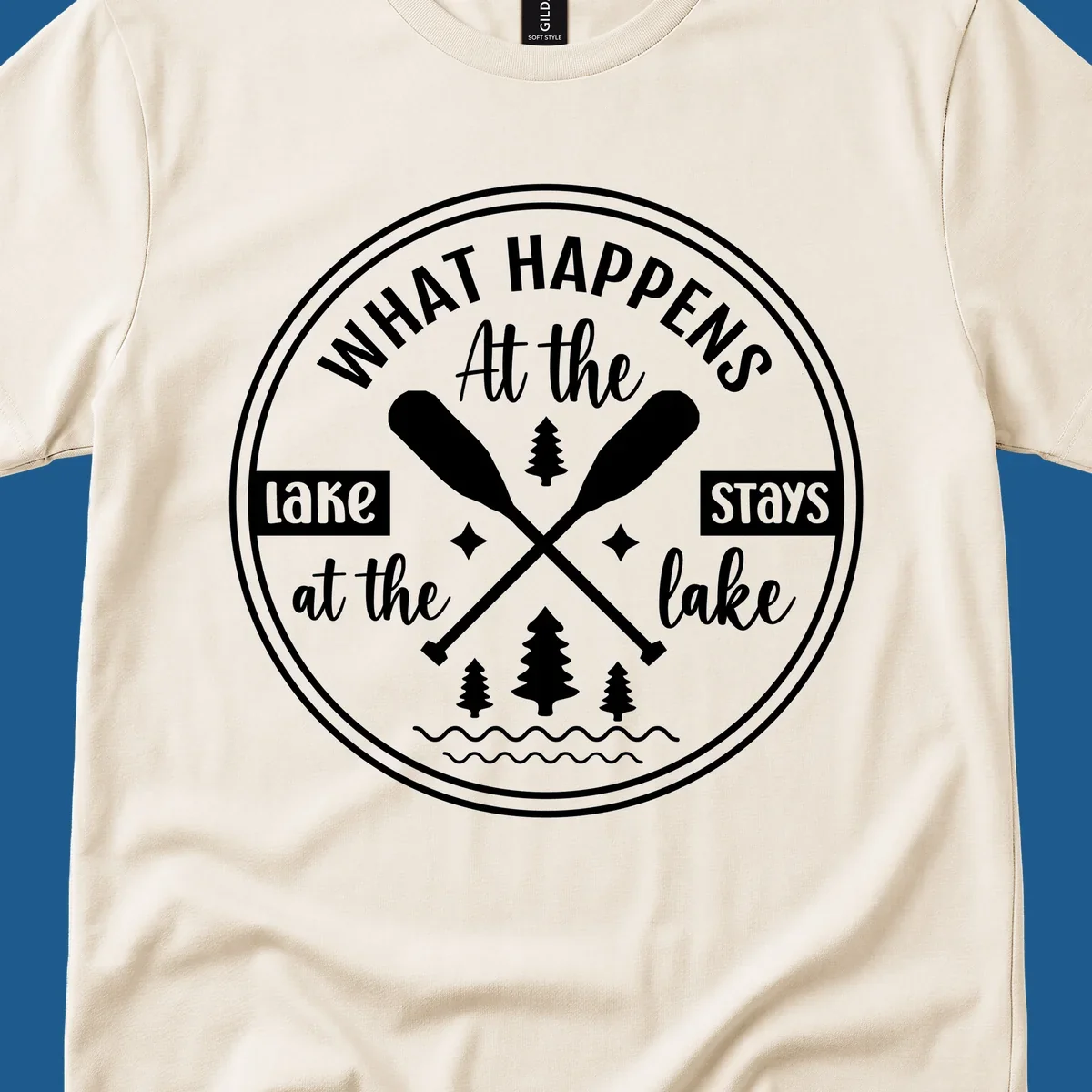 Lake life quote design with paddles and trees.