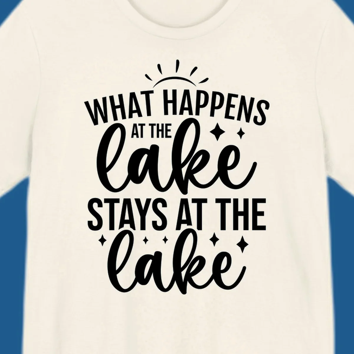 What happens at the lake stays at the lake typography design with sun rays and sparkles.