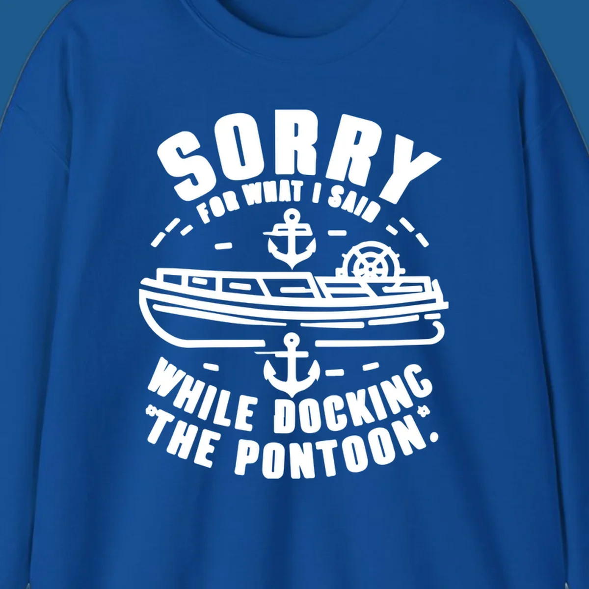 Text and illustration of a pontoon boat with anchors and a ship wheel, related to docking the pontoon.