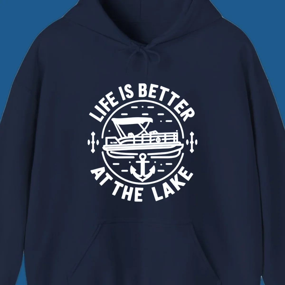 Circular design with "Life is Better At The Lake" text, pontoon boat, and anchor.