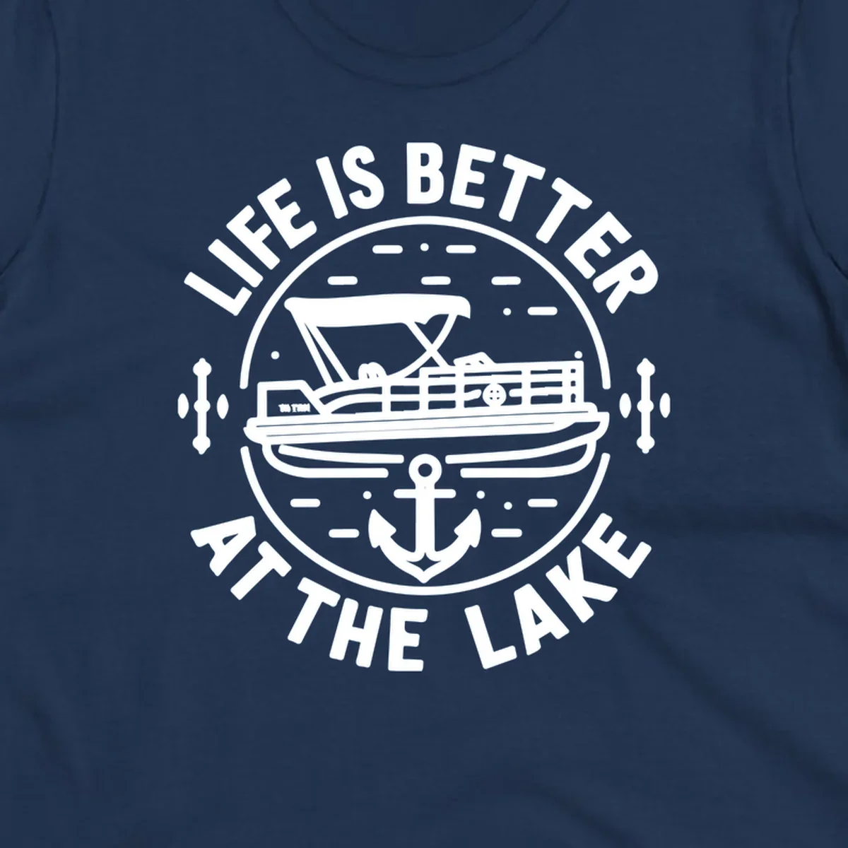 Circular design with "Life is Better At The Lake" text, pontoon boat, and anchor.