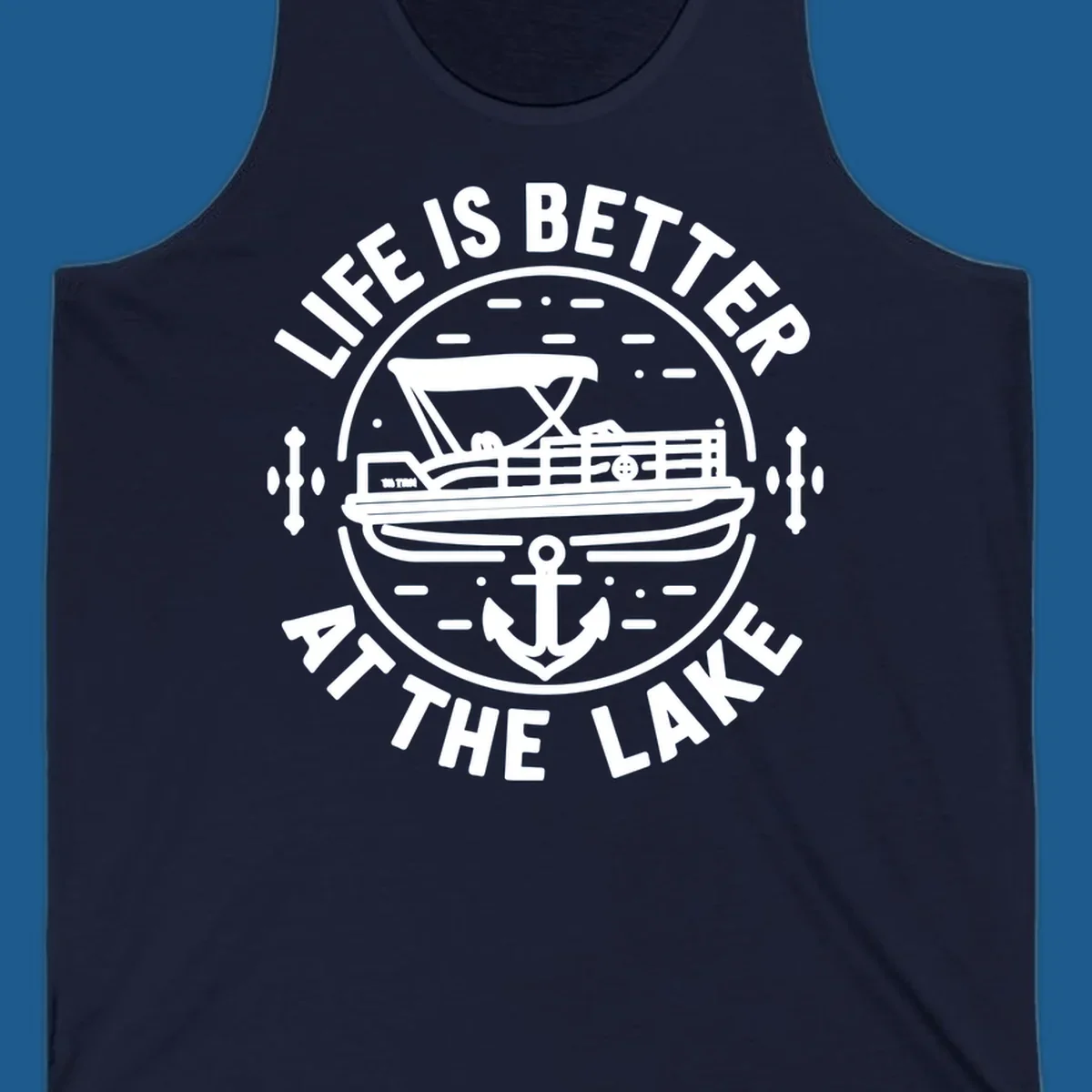 Circular design with "Life is Better At The Lake" text, pontoon boat, and anchor.