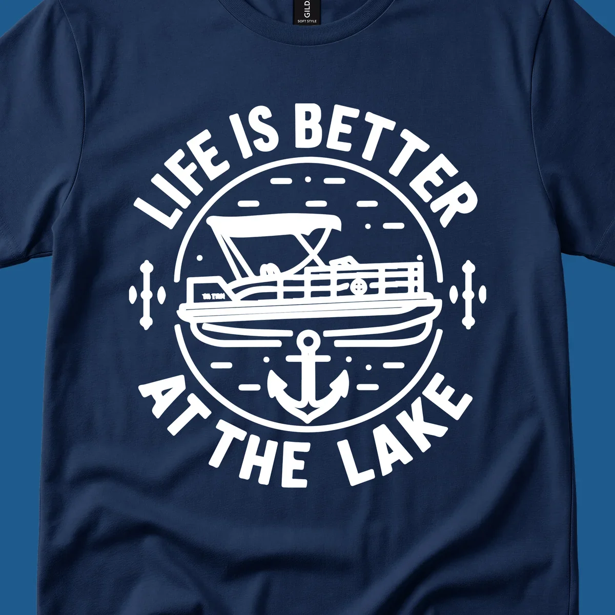 Circular design with "Life is Better At The Lake" text, pontoon boat, and anchor.