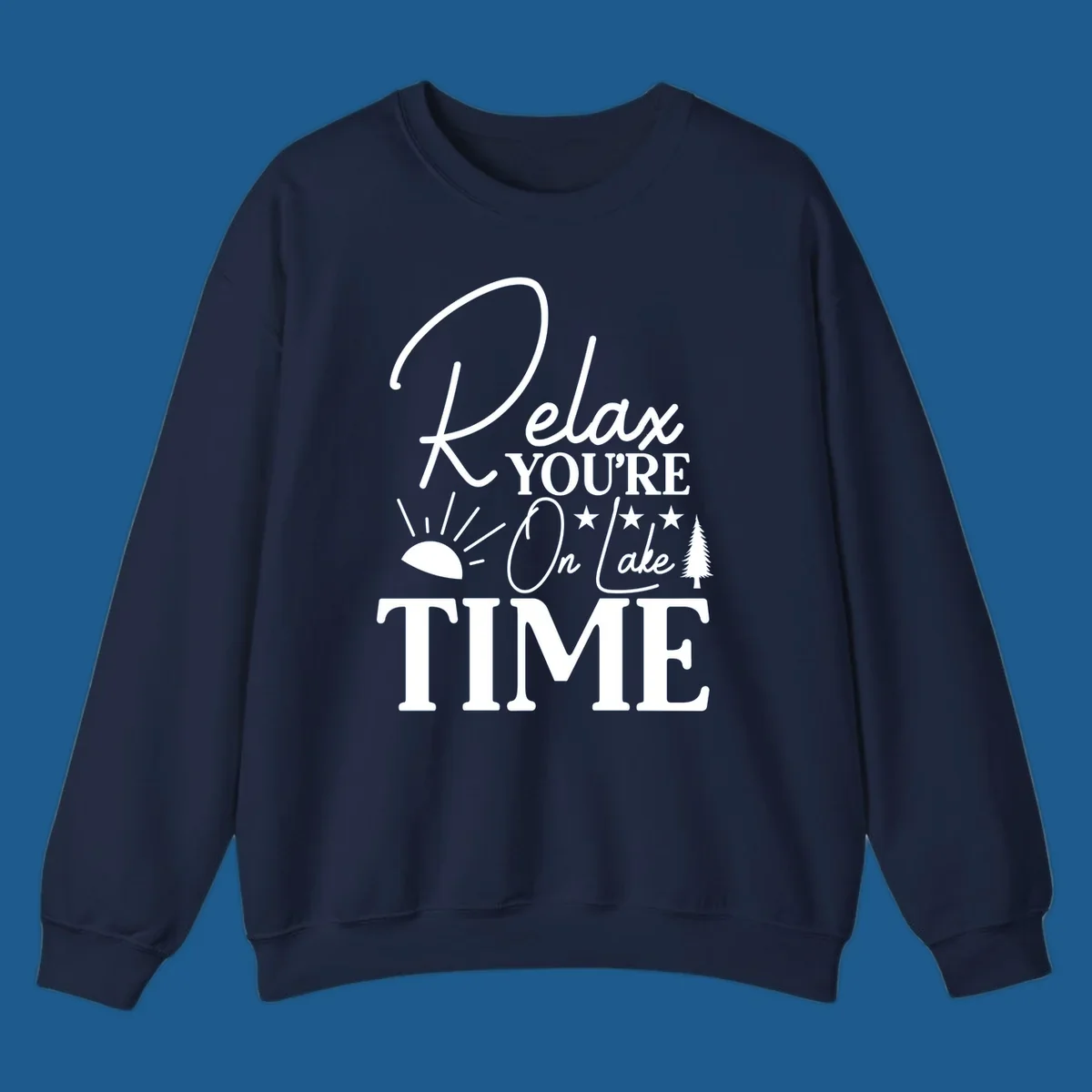 Relax You're On Lake Time text and graphics with sun rays and a pine tree.