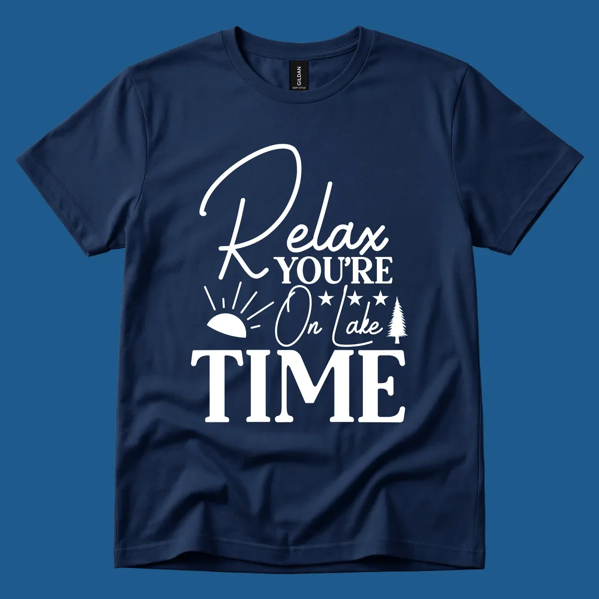 Relax You're On Lake Time text and graphics with sun rays and a pine tree.