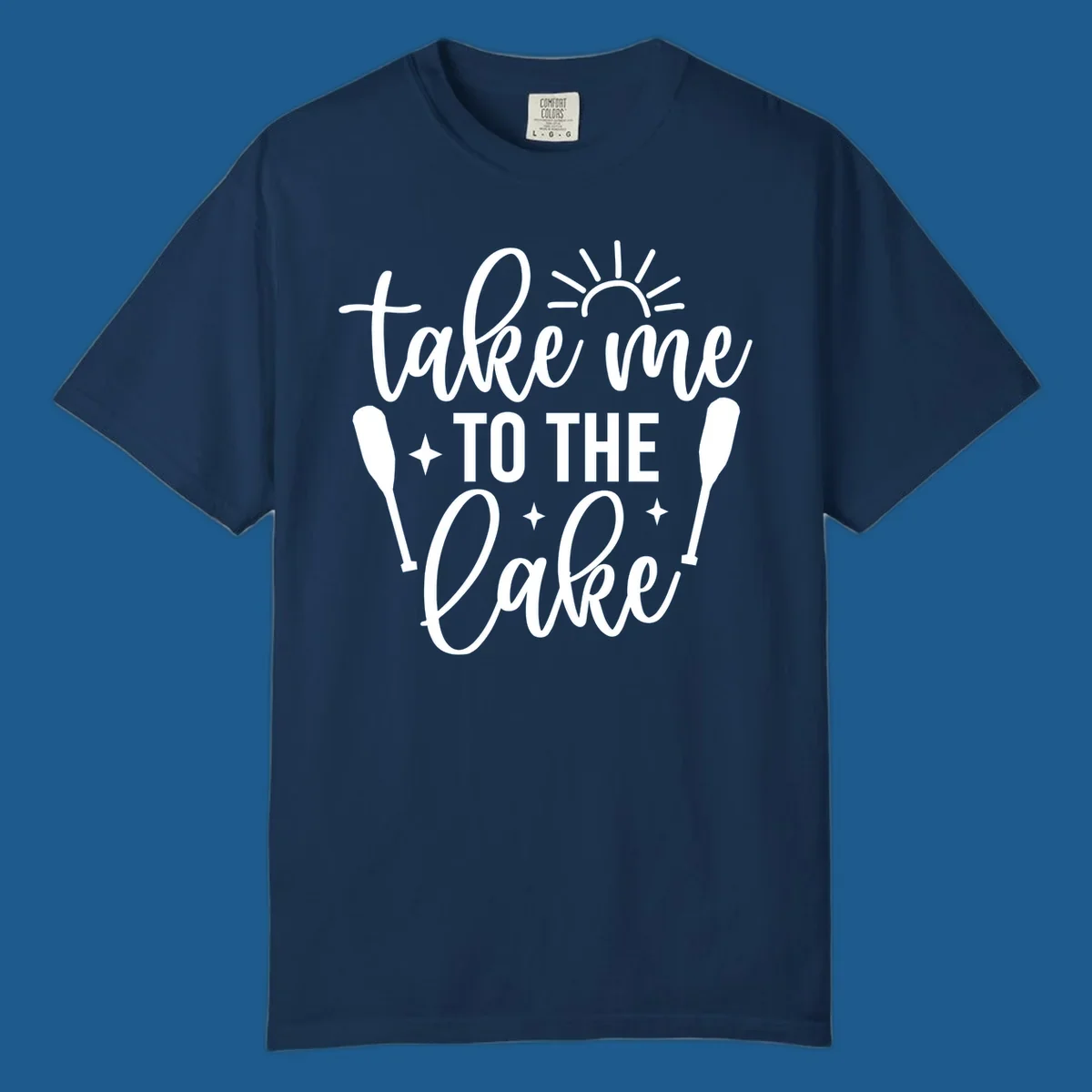 Typography design with 'take me TO THE Lake', sun, paddles, and stars for lake life vibes.
