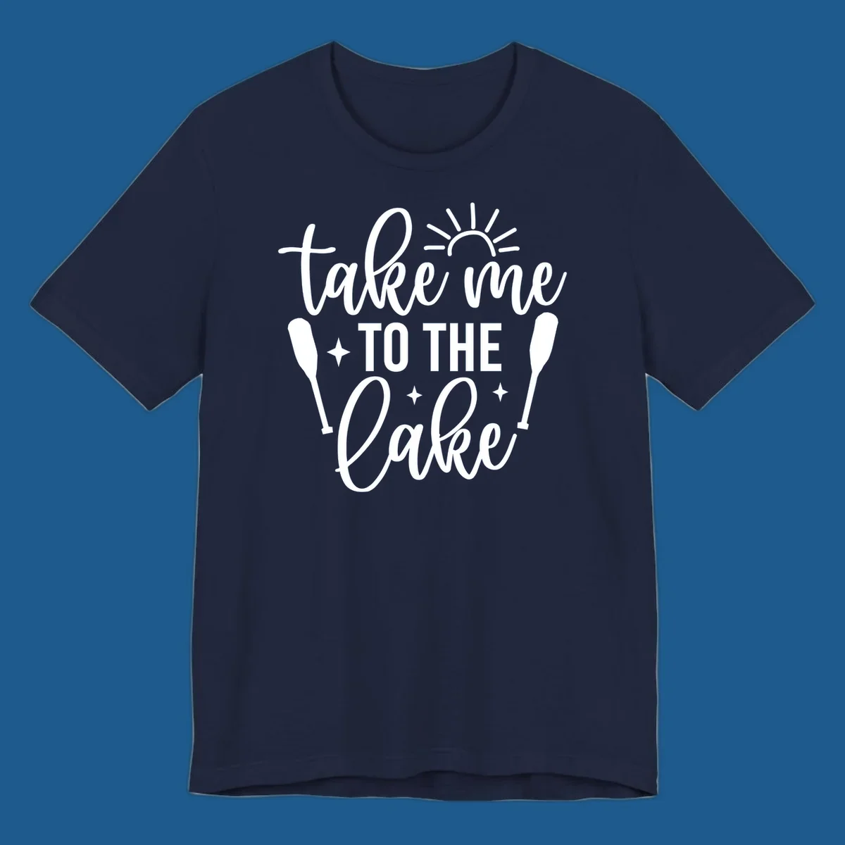 Typography design with 'take me TO THE Lake', sun, paddles, and stars for lake life vibes.