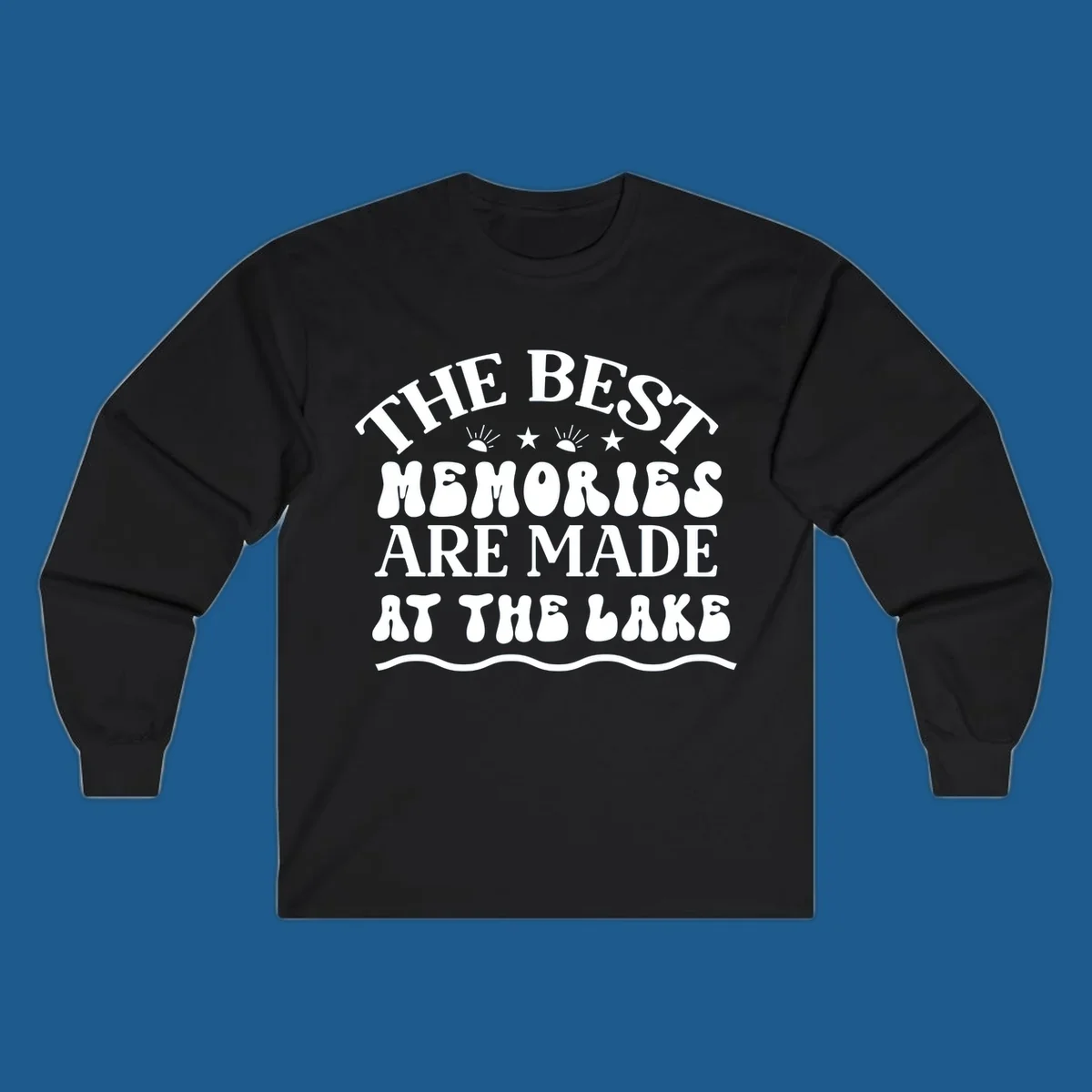 Retro typography design 'The Best Memories Are Made At The Lake' with sun rays and stars.