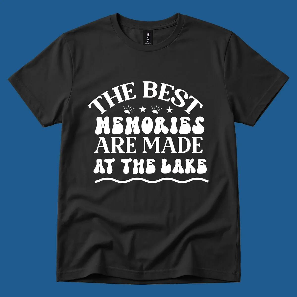 Retro typography design 'The Best Memories Are Made At The Lake' with sun rays and stars.
