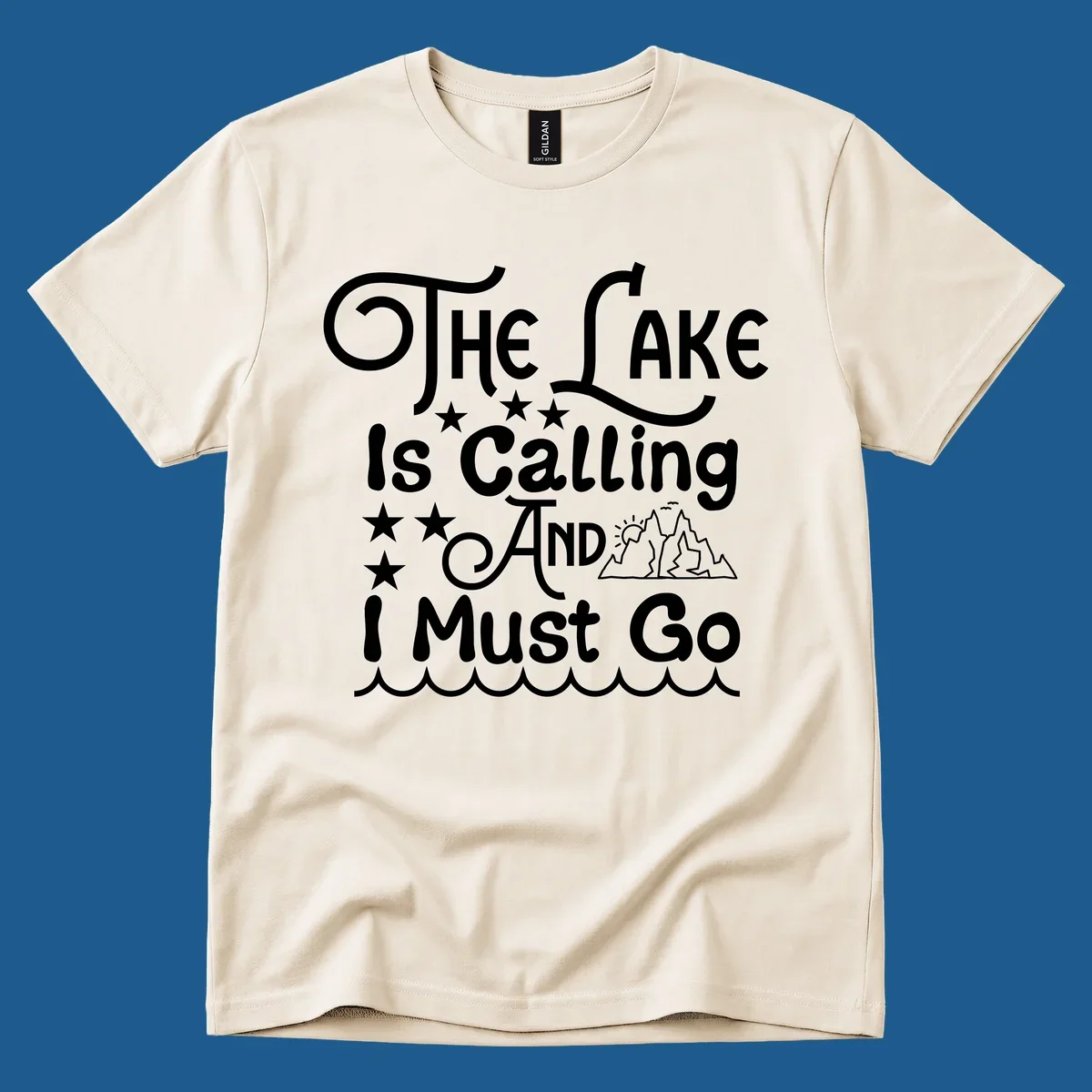 The Lake Is Calling And I Must Go text with mountains and water waves.