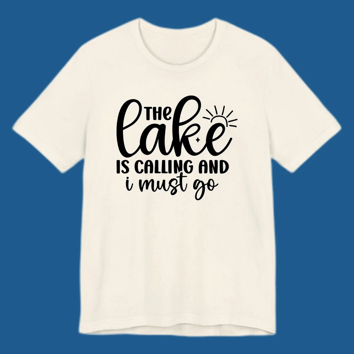 The lake is calling and I must go text with sun and star graphic