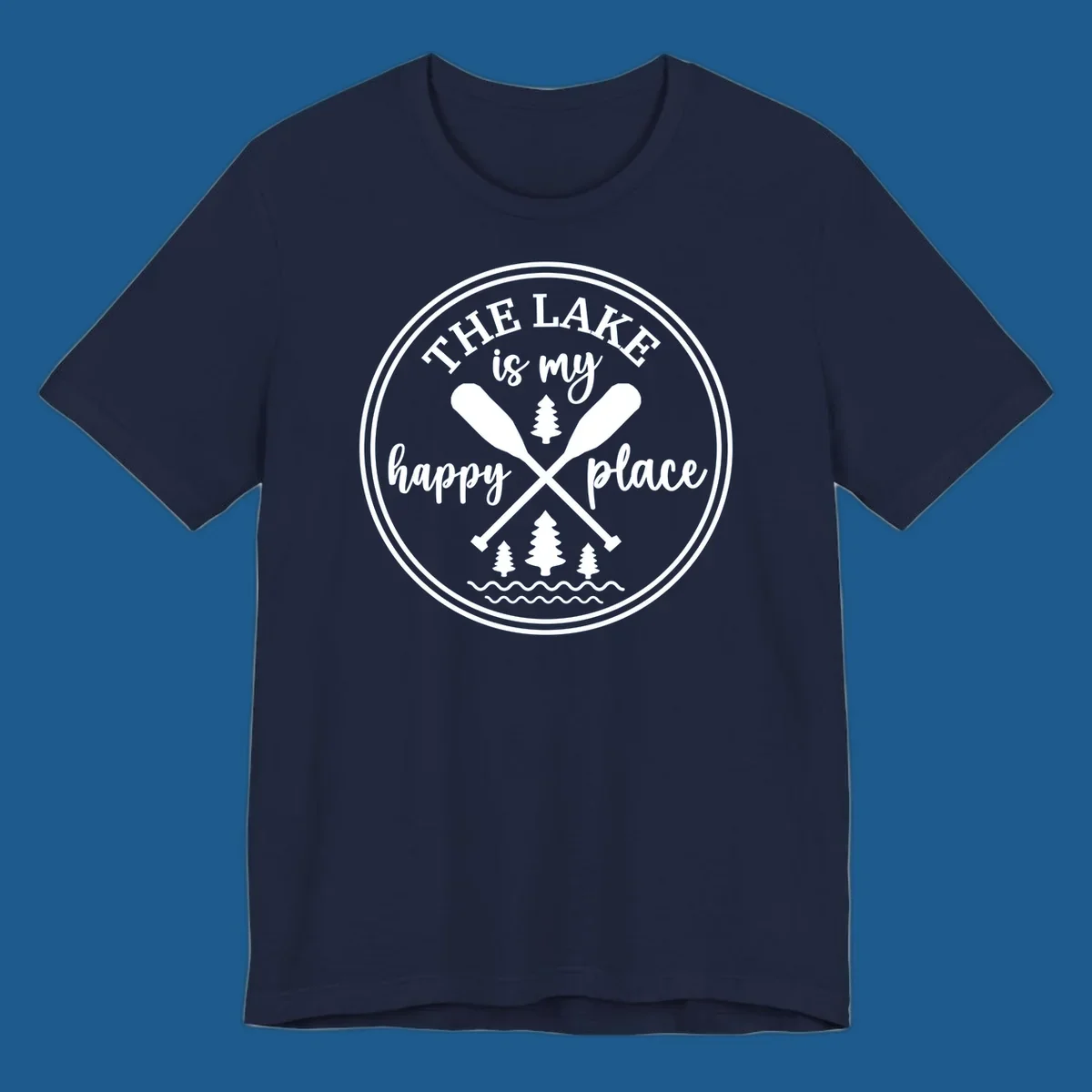 Circular graphic with text 'The Lake is my happy place', crossed oars, and pine trees - lake-happy-place.