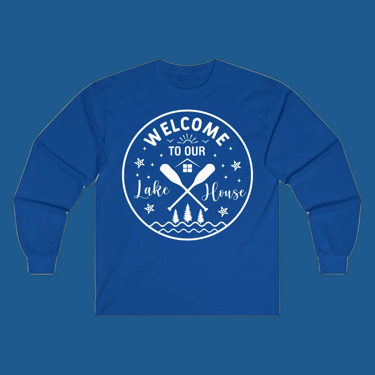Welcome to our lake house circular design with oars, house, trees, and text.
