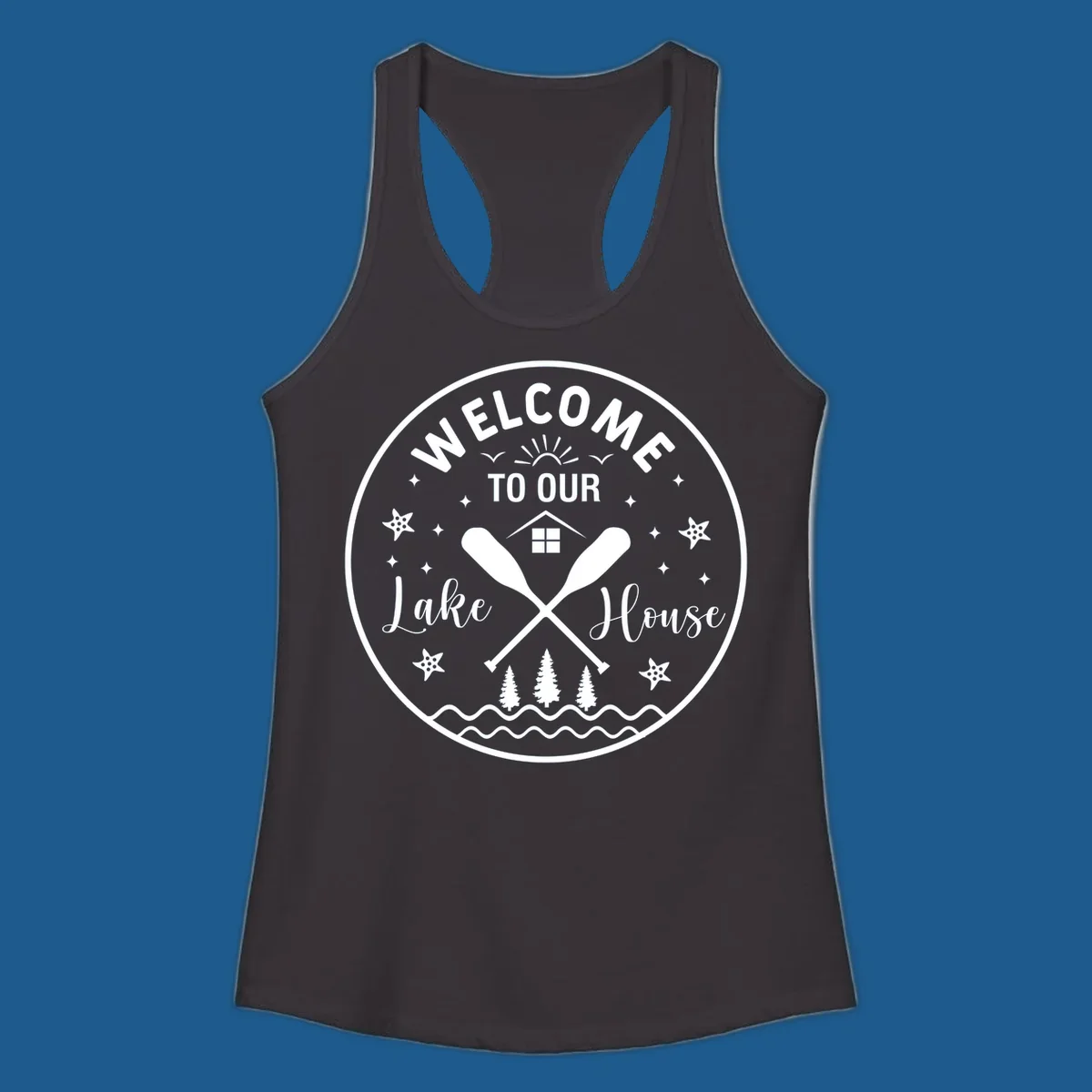 Welcome to our lake house circular design with oars, house, trees, and text.