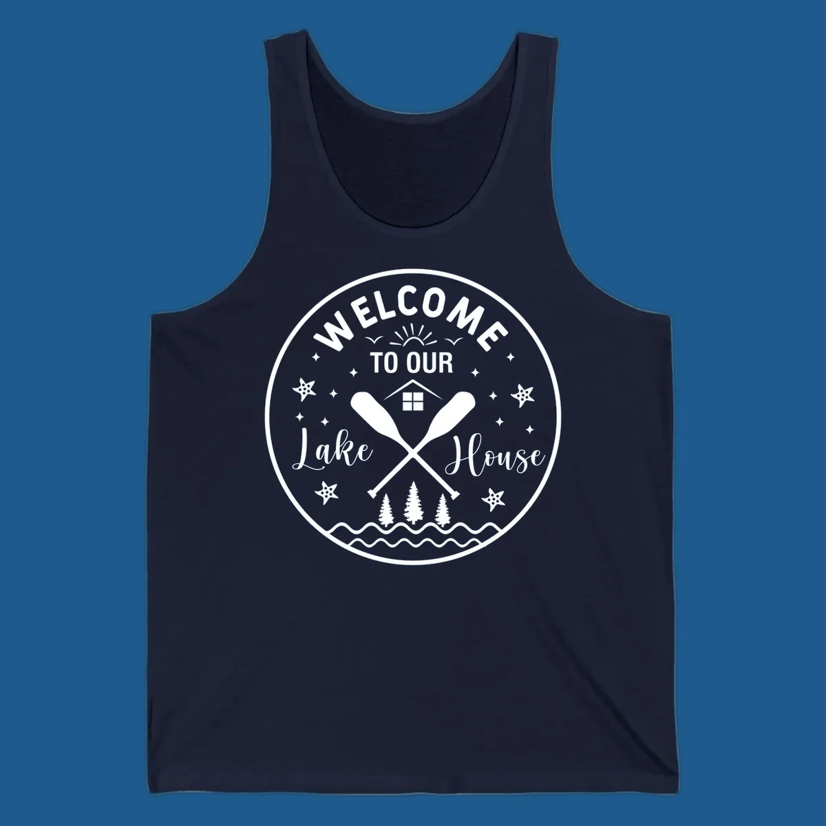 Welcome to our lake house circular design with oars, house, trees, and text.