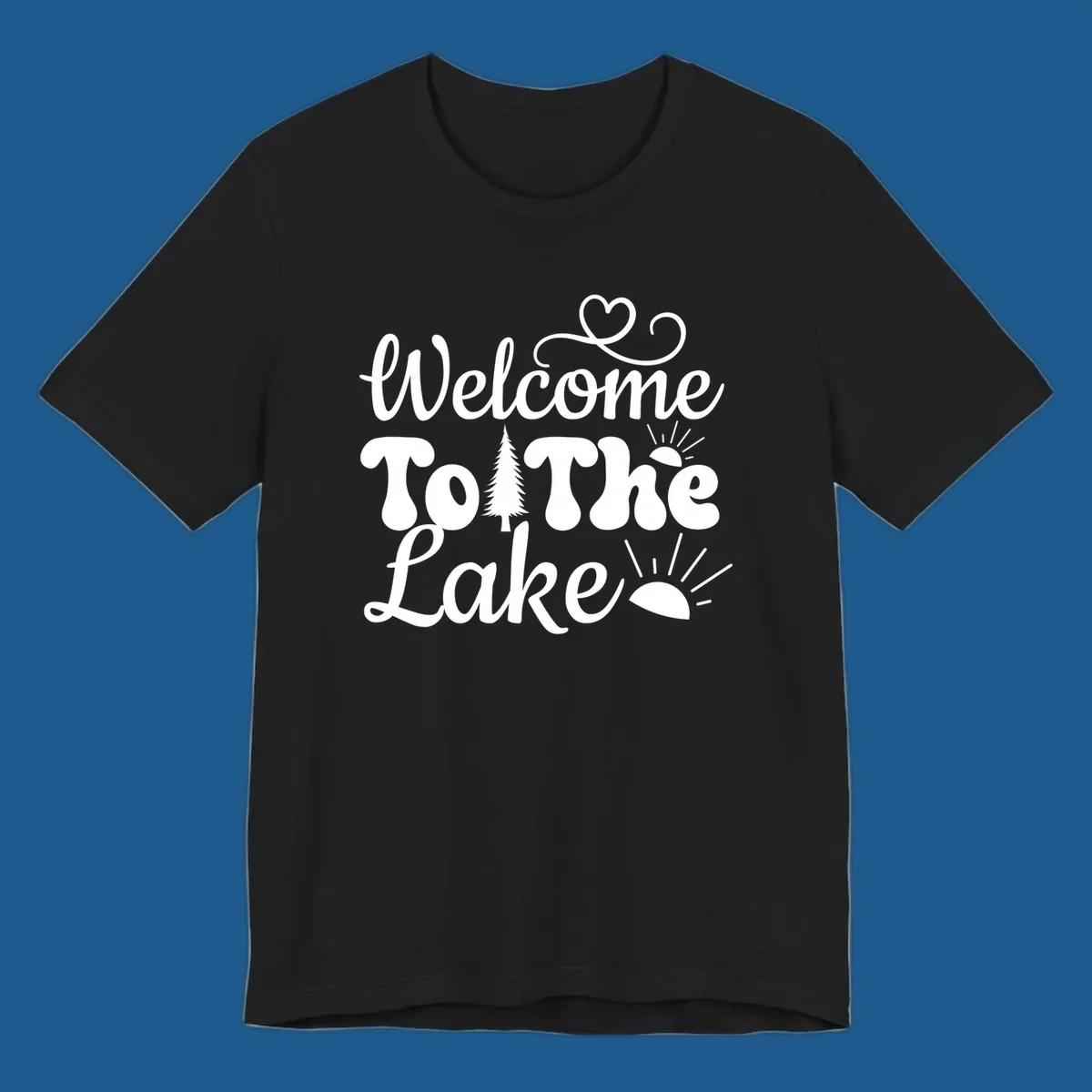 Welcome to the lake typography design with tree and sun graphics.
