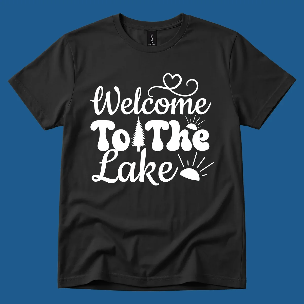 Welcome to the lake typography design with tree and sun graphics.