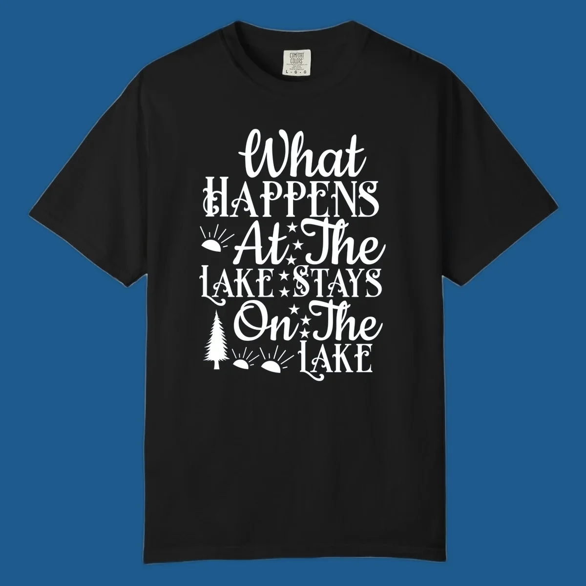 What Happens At The Lake text design with sun, stars, and pine tree.