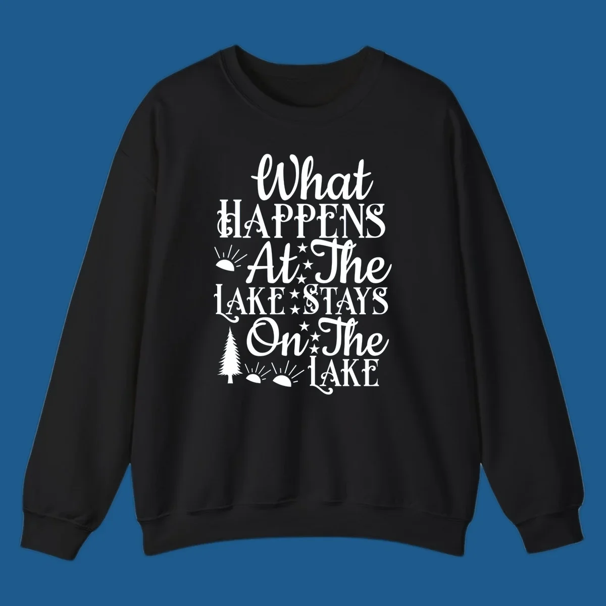 What Happens At The Lake text design with sun, stars, and pine tree.