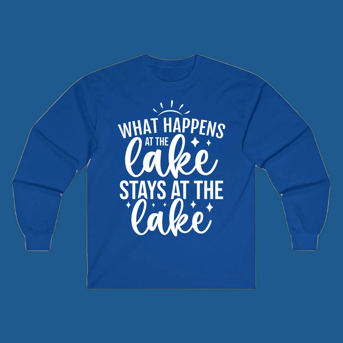 What happens at the lake stays at the lake typography design with sun rays and sparkles.