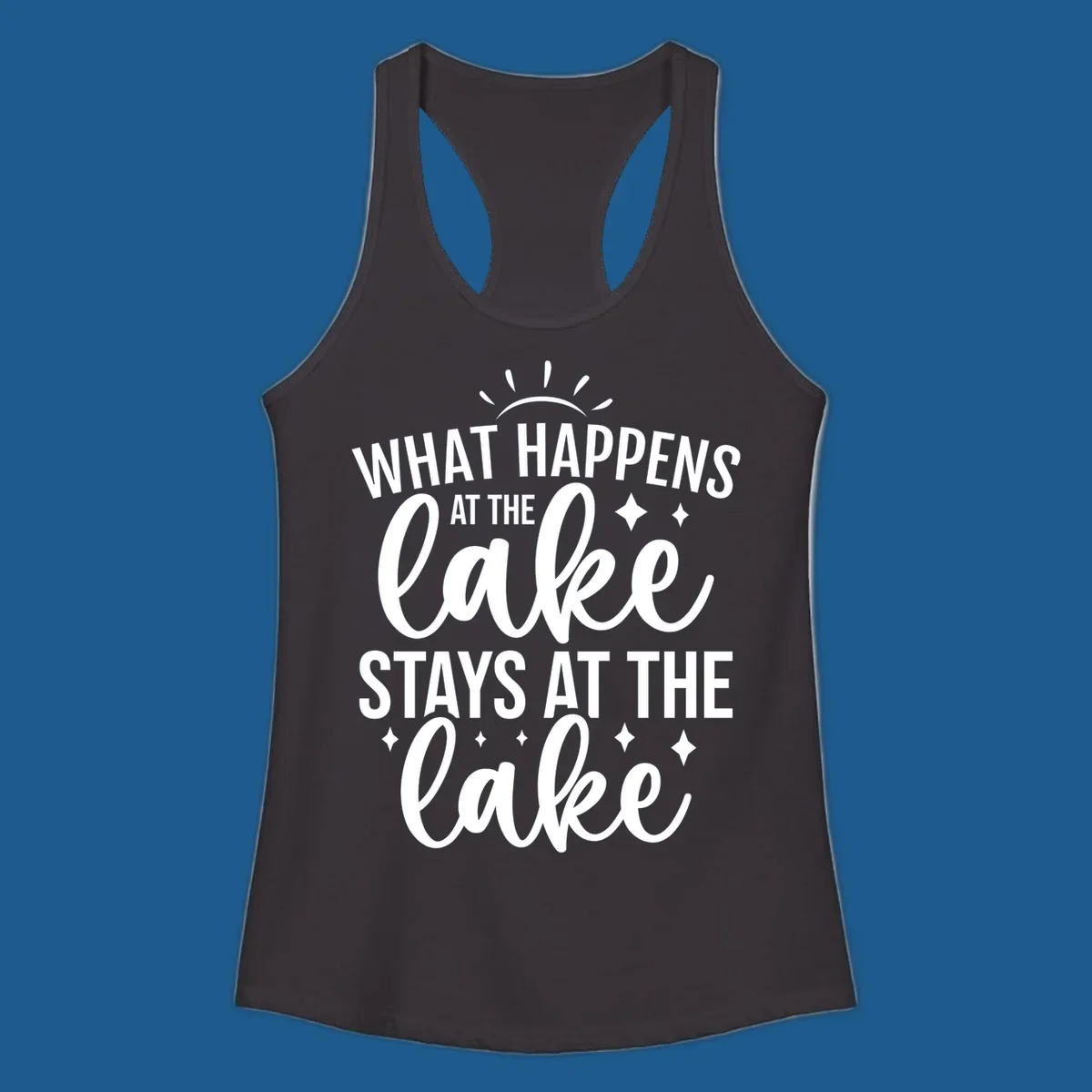 What happens at the lake stays at the lake typography design with sun rays and sparkles.