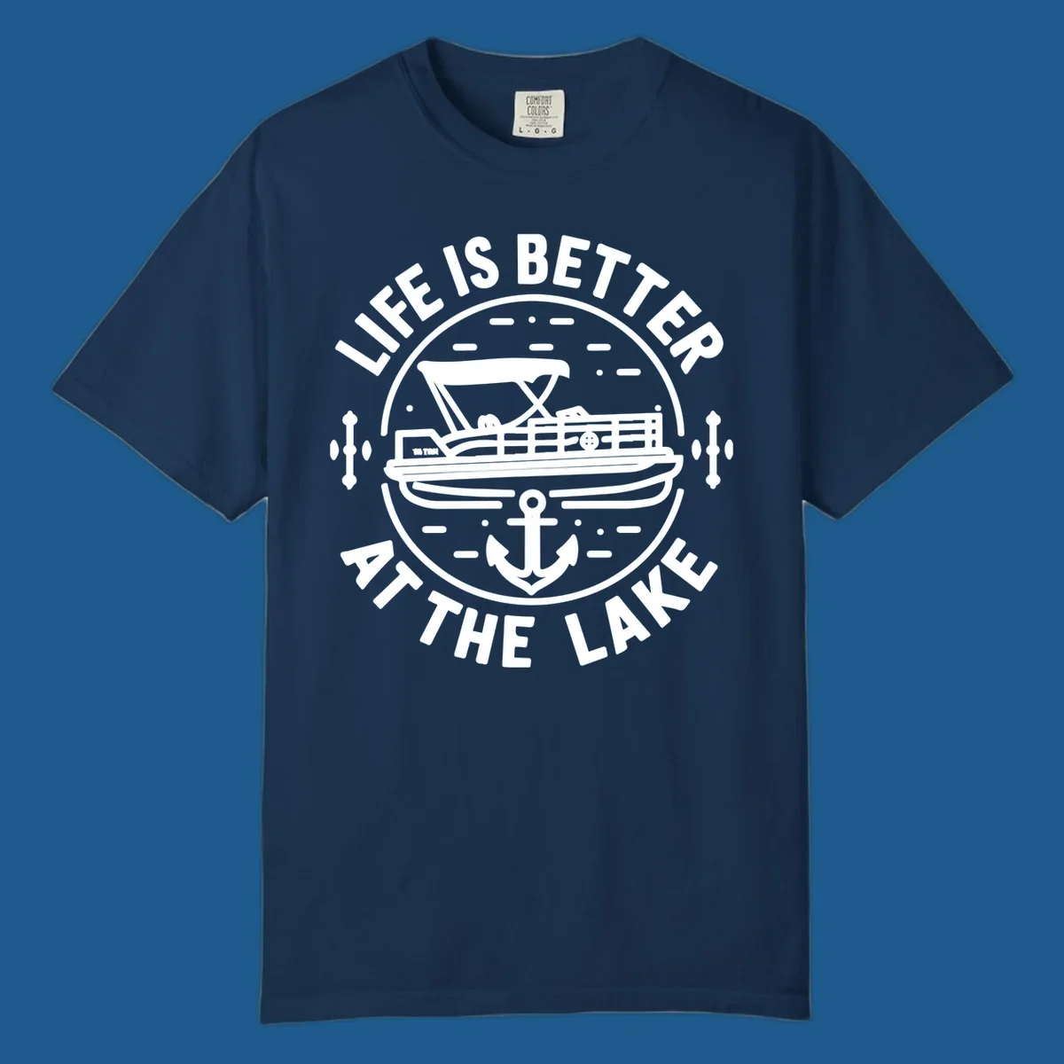 Circular design with "Life is Better At The Lake" text, pontoon boat, and anchor.