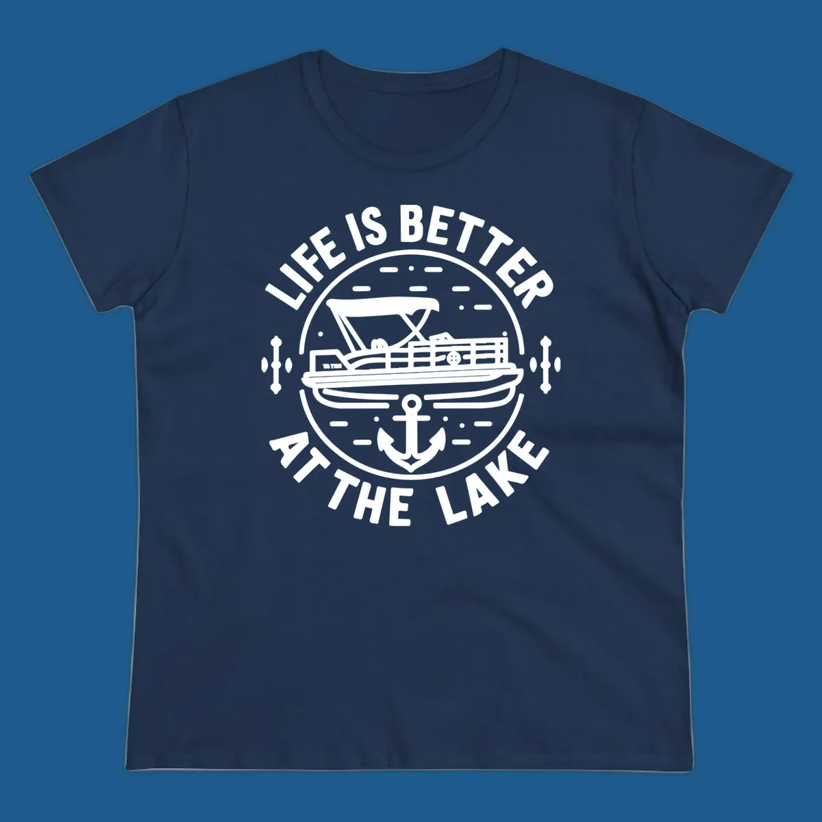 Circular design with "Life is Better At The Lake" text, pontoon boat, and anchor.