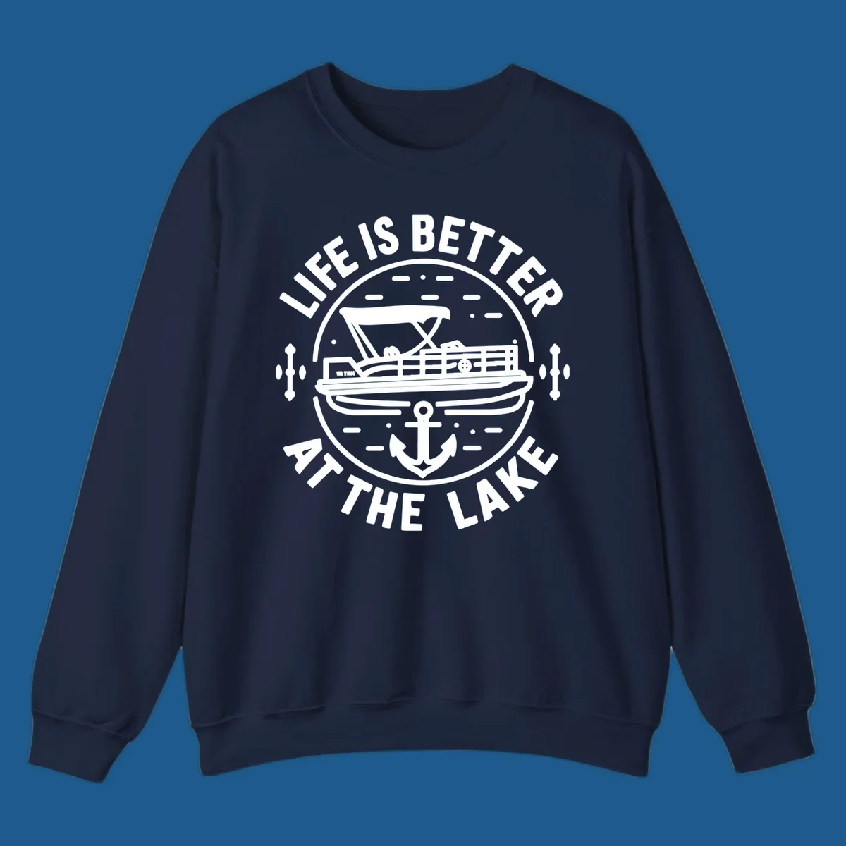 Circular design with "Life is Better At The Lake" text, pontoon boat, and anchor.