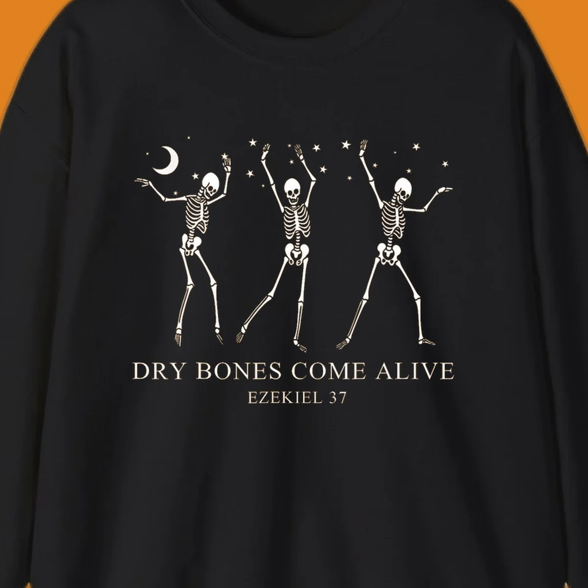 Three dancing skeletons under a moon and stars, with text 'Dry Bones Come Alive Ezekiel 37'.