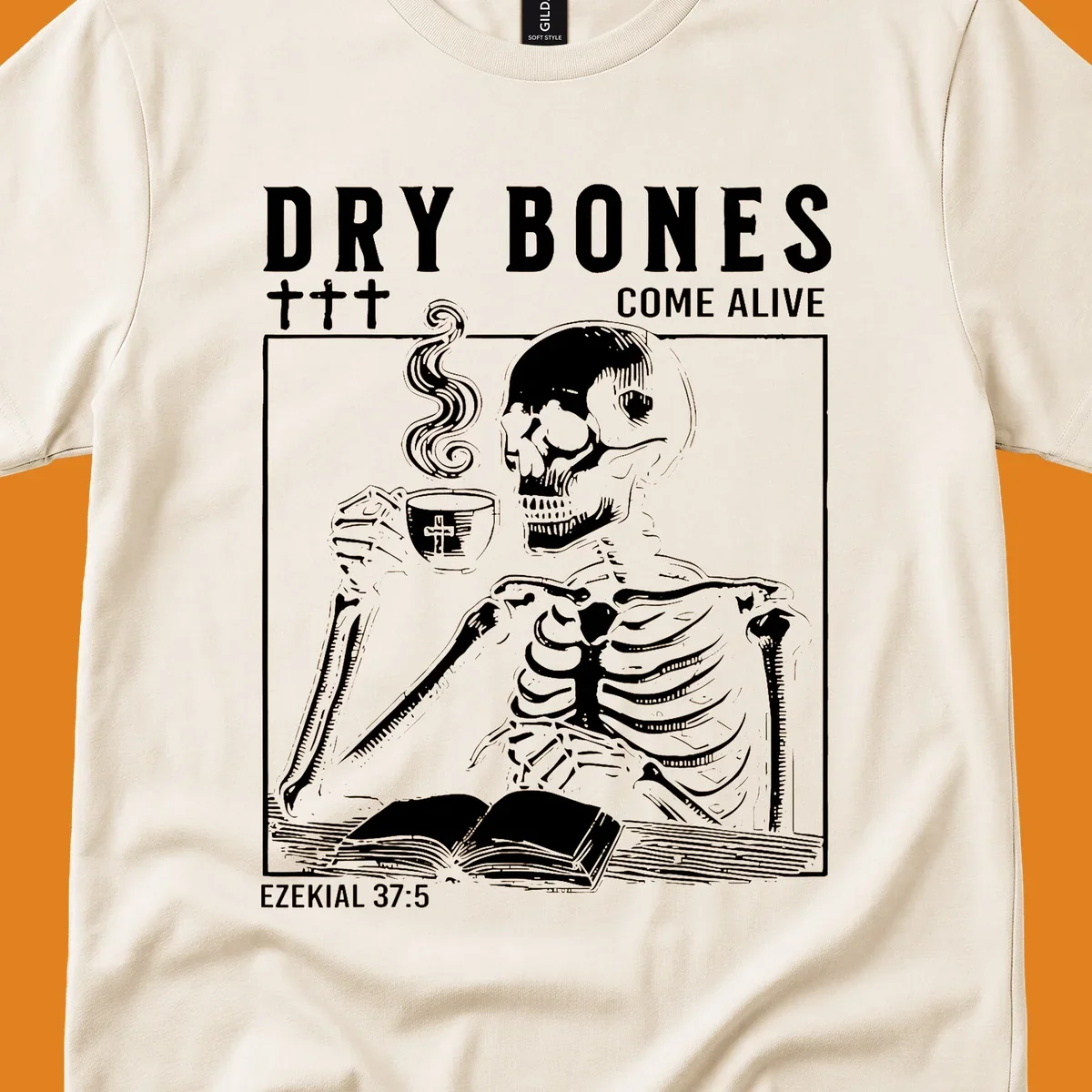 Skeleton reading a book and drinking coffee, with text 'Dry Bones Come Alive' and 'Ezekial 37:5'.