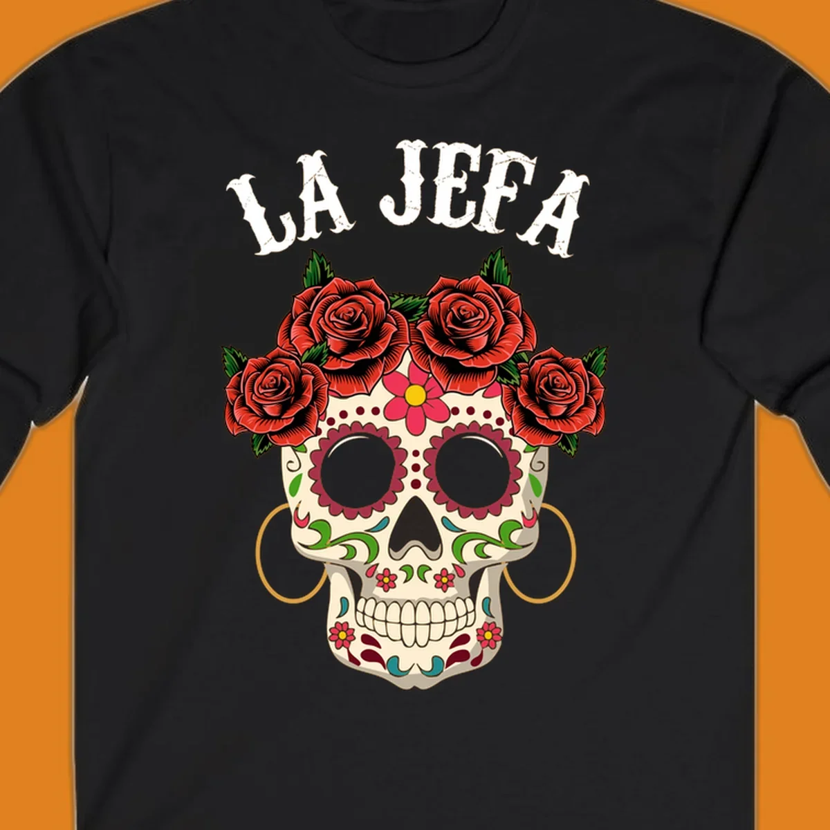 A colorful La Jefa sugar skull design with a crown of red roses and gold hoop earrings.